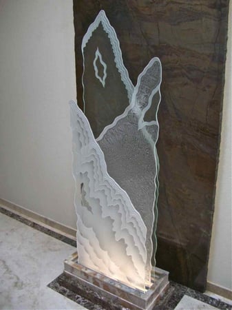 Sculpture showcasing a Frosted Glass Abstract Design with Sandblast Etched Glass Art by Sans Soucie Rugged Retreat Design