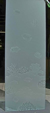Shower Partition showcasing a Frosted Glass Oceanic Design with Sandblast Etched Glass Art by Sans Soucie Tropical Fish Design