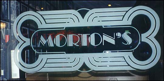 Partition showcasing a Frosted Glass Logos Design with Sandblast Etched Glass Art by Sans Soucie Morton's (similar look) Design