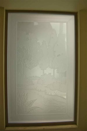 Window showcasing a Frosted Glass Landscapes Design with Sandblast Etched Glass Art by Sans Soucie Tranquil Meadows Design