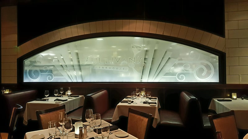 Window with Frosted Glass Logos Sullivans Steakhouse (similar look) Design by Sans Soucie