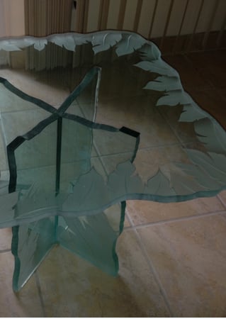 Glass Coffee Table featuring a Frosted Glass Tropical Design Sandblast Etched Glass Banana Leaves Edge Design by Sans Soucie