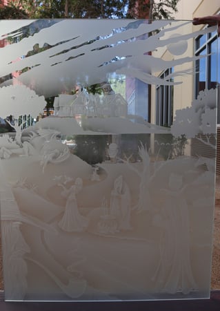 Window showcasing a Frosted Glass Whimsical Design with Sandblast Etched Glass Art by Sans Soucie Fantasy Folklore II Design