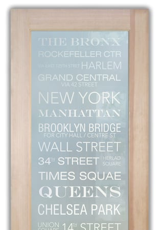 Bathroom Door with a Frosted Glass NYC Sayings Design for Semi-Private by Sans Soucie Art Glass
