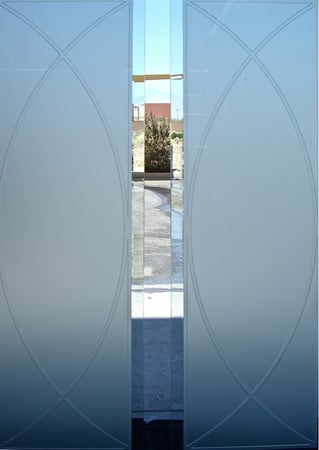 Cabinet Glass showcasing a Frosted Glass Geometric Design with Sandblast Etched Glass Art by Sans Soucie Arcs Design