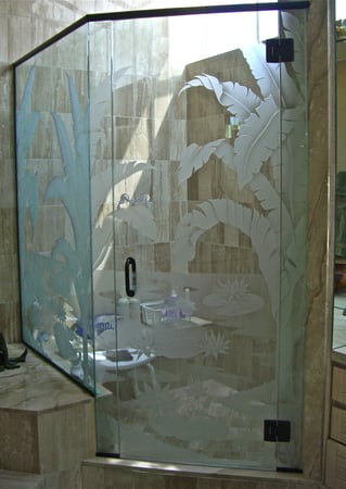 Shower Enclosure showcasing a Frosted Glass Tropical Design with Sandblast Etched Glass Art by Sans Soucie Banana Leaves Lotus Design