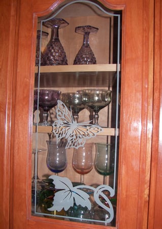 Cabinet Glass showcasing a Frosted Glass Borders Design with Sandblast Etched Glass Art by Sans Soucie Butterfly Leaf Border Design