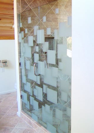 Shower Enclosure showcasing a Frosted Glass Geometric Design with Sandblast Etched Glass Art by Sans Soucie Cubes Design