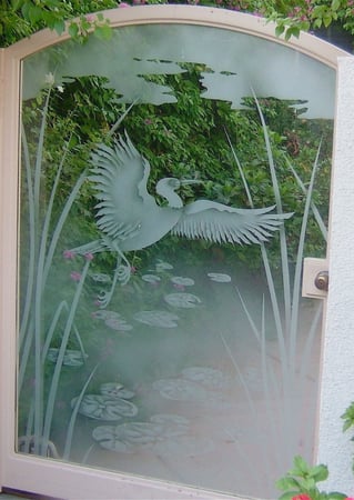 Gate Glass Insert showcasing a Frosted Glass Wildlife Design with Sandblast Etched Glass Art by Sans Soucie Dancing Egret Design