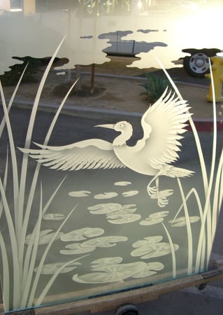 Partition showcasing a Frosted Glass Wildlife Design with Sandblast Etched Glass Art by Sans Soucie Dancing Egret Design