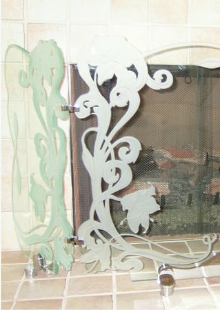 Fireplace Screen showcasing a Frosted Glass Floral Design with Sandblast Etched Glass Art by Sans Soucie Hibiscus Ribbon  Design
