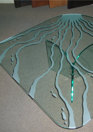 Glass Coffee Table featuring Frosted Glass Design Etched Glass by Sans Soucie Art Glass with Custom Abstract Design Living Water