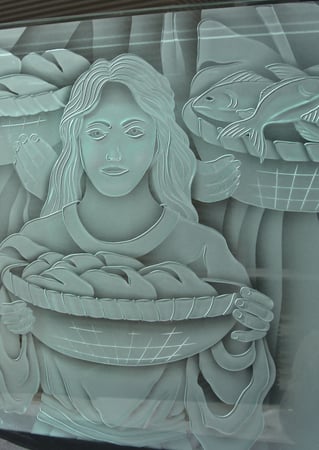 Window featuring a Frosted Glass Liturgical Design Sandblast Etched Glass Miracle of the Loaves and Fish Design by Sans Soucie