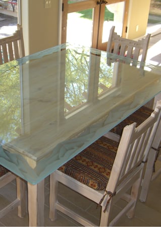 Glass Dining Table featuring a Frosted Glass Desert Design Sandblast Etched Glass Mountains Design by Sans Soucie