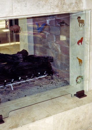 Fireplace Screen showcasing a Frosted Glass Southwest Design with Sandblast Etched Glass Art by Sans Soucie Petroglyphs Design