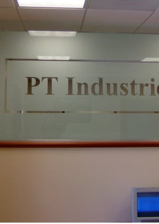 Partition with Frosted Glass Logos PT Industries (similar look) Design by Sans Soucie