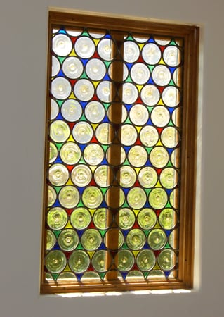 Window showcasing a Frosted Glass Traditional Design with Sandblast Etched Glass Art by Sans Soucie Rondels Design