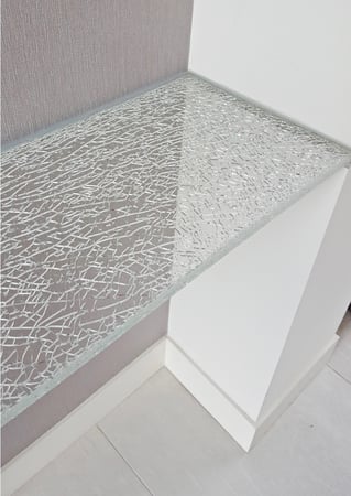 Shelf showcasing a Frosted Glass Shattered Glass Design with Sandblast Etched Glass Art by Sans Soucie Shattered Glass Ultra Clear Design