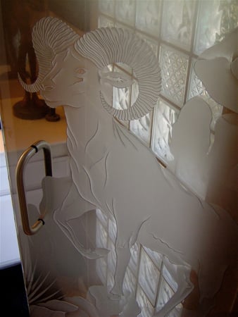 Shower Door featuring a Frosted Glass Wildlife Design Sandblast Etched Glass Bighorn Design by Sans Soucie