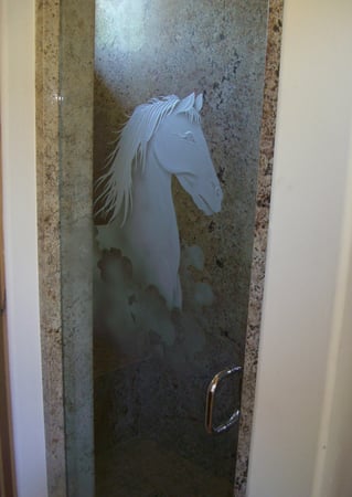 Shower Door showcasing a Frosted Glass Western Design with Sandblast Etched Glass Art by Sans Soucie Horse Bust Design