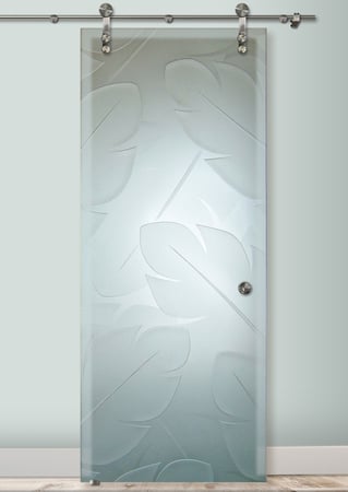 Glass Barn Door featuring a Frosted Glass Tropical Design Sandblast Etched Glass Banana Leaves Design by Sans Soucie