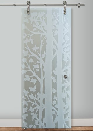 Glass Barn Door showcasing a Frosted Glass Trees Design with Sandblast Etched Glass Art by Sans Soucie Forest Trees Design