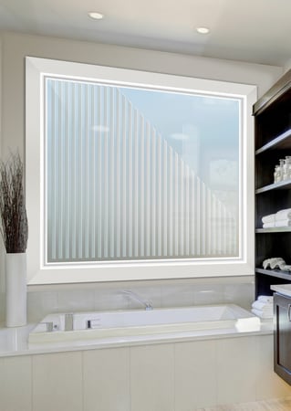Window showcasing a Frosted Glass Geometric Design with Sandblast Etched Glass Art by Sans Soucie Sleek Bands Vertical Design