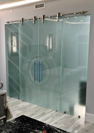 Glass Barn Door with a Frosted Glass Sun Odyssey XI Geometric Design for Private by Sans Soucie Art Glass