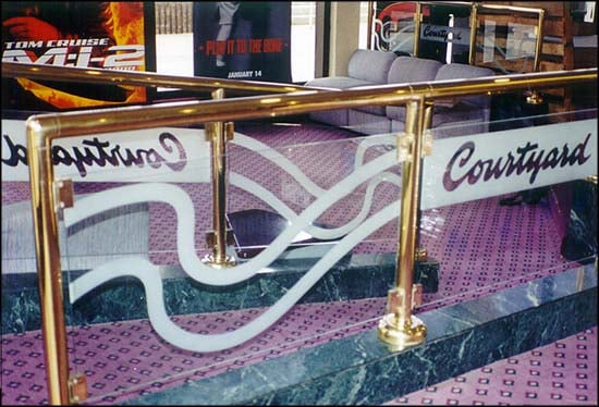 Handrail with a Frosted Glass Courtyard Theater (similar look) Logos Design for Semi-Private by Sans Soucie Art Glass