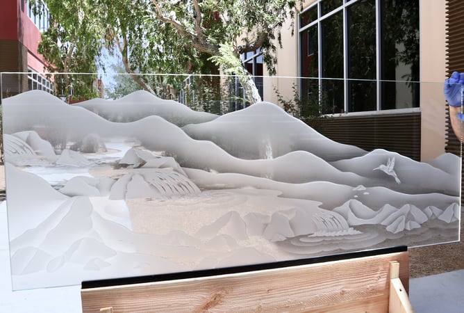Partition showcasing a Frosted Glass Landscapes Design with Sandblast Etched Glass Art by Sans Soucie Falls Design