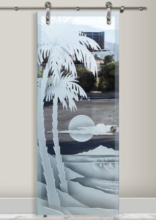 Glass Barn Door showcasing a Frosted Glass Palm Trees Design with Sandblast Etched Glass Art by Sans Soucie Palm Sunset Waves Design