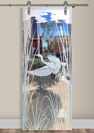 Glass Barn Door showcasing a Frosted Glass Wildlife Design with Sandblast Etched Glass Art by Sans Soucie Swooping Egret Design