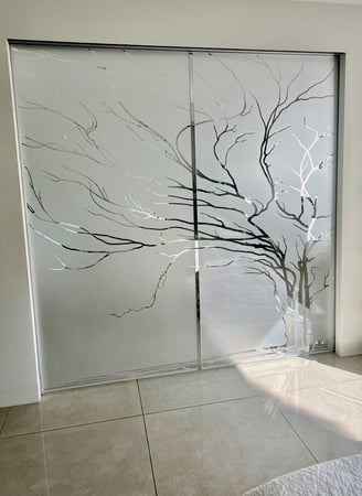 Shower Door showcasing a Frosted Glass Trees Design with Sandblast Etched Glass Art by Sans Soucie Wispy Tree Wild Design