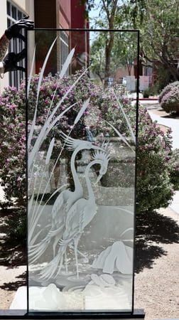 Partition showcasing a Frosted Glass Wildlife Design with Sandblast Etched Glass Art by Sans Soucie Cranes & Cattails Design