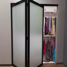 bifold closet door single glass panel with black metal frame