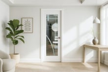 Interior office door with glass in a modern minimalist workspace.