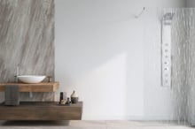 Modern bathroom layout showcasing a glass shower panel in high-end interior design | Glass Shower Panels vs. Wet Rooms: Which Is Best for Your Home