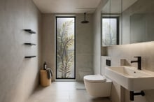 Frosted glass window, the best privacy option for bathroom windows. A decorative frosted glass for bathroom windows featuring a fern leaf design in a modern, light-colored bathroom.