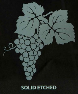 This grape cluster is "solid etched", a single-stage sandblast.  The design elements are "solid" white, with no clear areas or "shading".