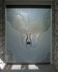 "Metamorphosis" all glass doors, one of our Signature Design Styles.