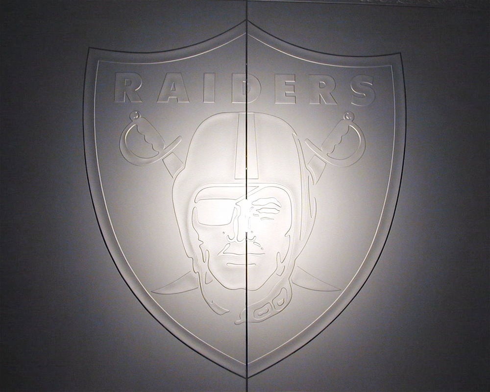 Etched glass, carved glass Raiders logo on Glass Doors