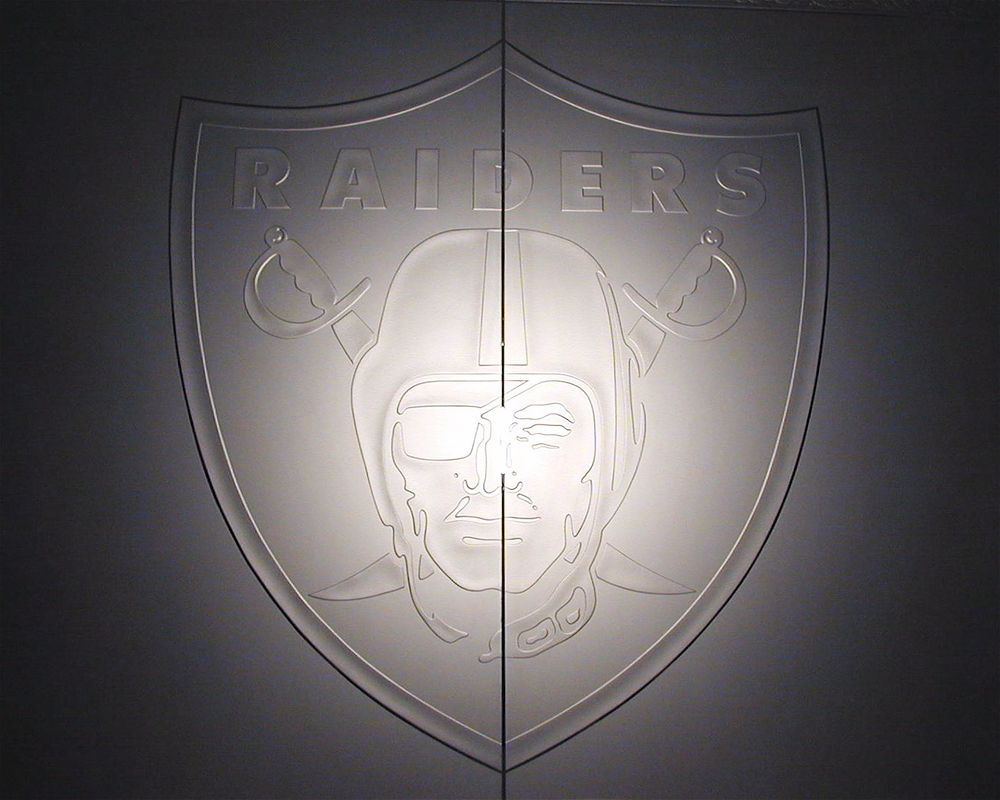 Etched glass, carved glass Raiders logo on Glass Doors