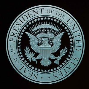 The U.S. Presidential Seal, carved in glass by Sans Soucie in 2008, for the Tribute Room aboard the aircraft carrier, "The George H.W. Bush (CVN 77)".