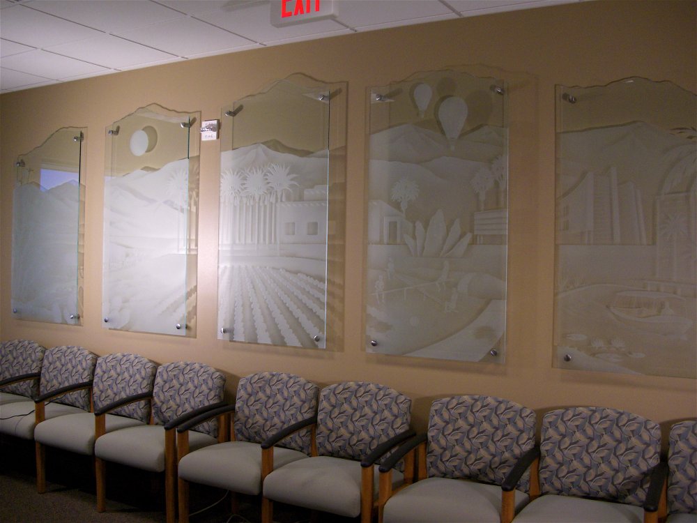 "The History of Palm Desert" depicted in etched, carved art glass wall pieces at Kaiser Medical Offices, Palm Desert.