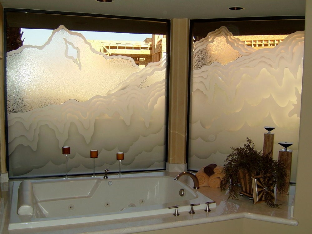 Decorative glass window, etched for privacy for tub & shower area.