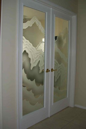 Door Glass etched and carved with Sans Soucie Rugged Retreat design.