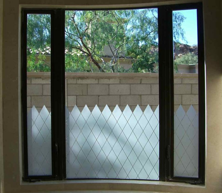 Etched Glass Bathroom Privacy Windows, featuring a Diamond Grid Pattern.  The etching comes up just far enough on the window to glass to provide the privacy level needed.  The top portion is left clear, allowing for visibility which creates a really nice, open feel in the room, while still having the privacy needed in the tub and shower area.