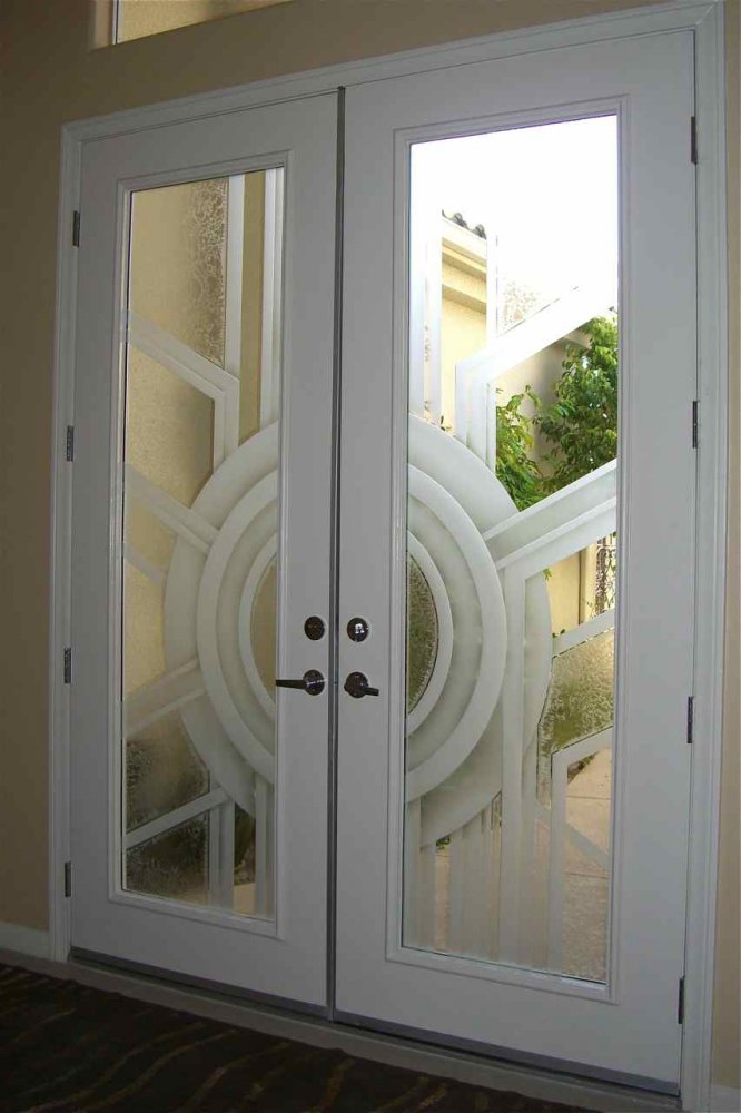"Sun Odyssey", decorative etched and carved door glass.