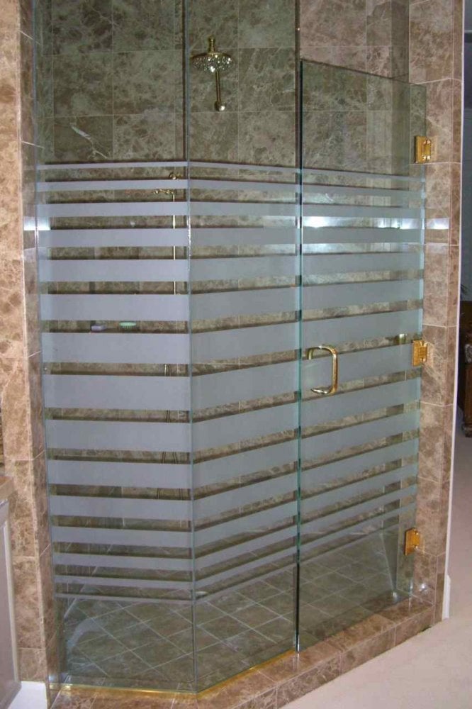 Etched glass design features bands that expand in width as they move from the center of the design outward.