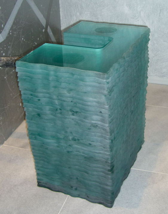 A view of the vanity glass base, as it was being assembled.  Each layer is 3/4" thick, regular clear glass.  The thicker the glass, the greener the hue.  When glass is layered, even more so.